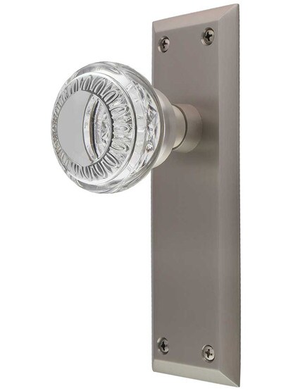 New York Door Set with Ovolo Crystal-Glass Knobs in Satin Nickel.
